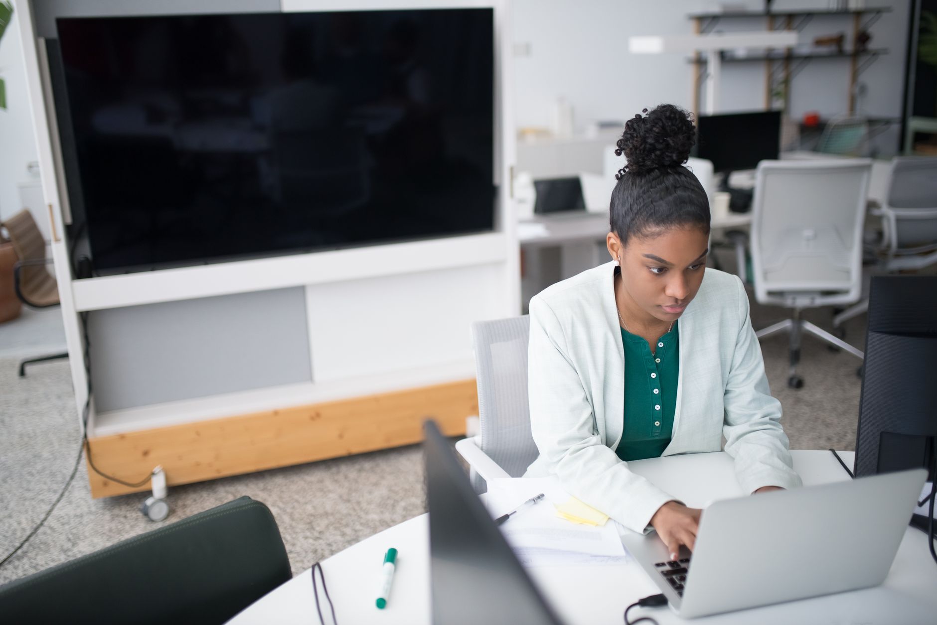 Professional in modern office reviewing information